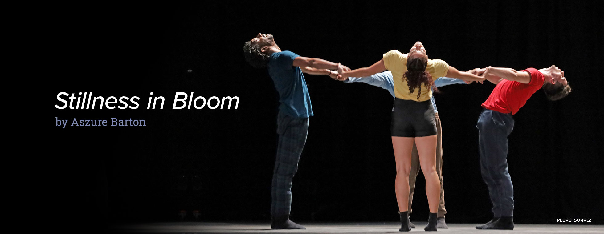 In a scene from “Stillness in Bloom,” four dancers standing in a circle hold hands and lean their heads back. 