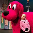 The “Big Red Dog” dwarfs his friend Emily Elizabeth, who poses shyly.