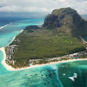 An aerial view of a tropical island in the Pacific ocean.